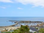 Enjoy the evening walking along the cobb harbour wall at Lyme Regis, after sampling the town's many independent eateries Enjoy the evening walking along the cobb harbour wall at Lyme Regis, after sampling the town's many independent eateries