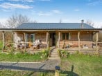 A unique, hand-crafted wood cabin situated in a secluded meadow A unique, hand-crafted wood cabin situated in a secluded meadow