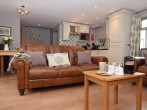 Spacious and bright open-plan lounge/ kitchen/ dining area