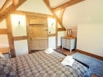 Farmhouse bedroom with exposed beams Farmhouse bedroom with exposed beams