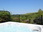 Enjoy a relaxing soak in the hot tub taking in the far-reaching views Enjoy a relaxing soak in the hot tub taking in the far-reaching views