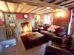 Barn sitting room with open fire Barn sitting room with open fire