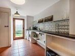 Utility room with washing machine and dryer Utility room with washing machine and dryer