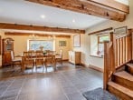 Large dining table can seat up to eight guests comfortably Large dining table can seat up to eight guests comfortably