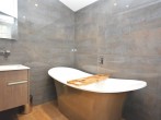 En-suite bathroom with free standing bath