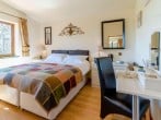 King-size bedroom with countryside views King-size bedroom with countryside views