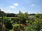 Admire the rural views from the balcony and across the surrounding gardens