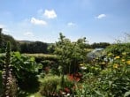Admire the rural views from the balcony and across the surrounding gardens Admire the rural views from the balcony and across the surrounding gardens