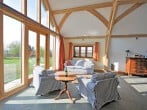 Lounge area with floor to ceiling windows