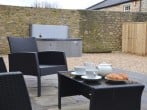 Outside seating area and hot tub Outside seating area and hot tub