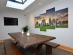 Dining area with large flatscreen TV Dining area with large flatscreen TV