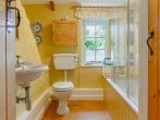 Quirky bathroom with shower over bath Quirky bathroom with shower over bath