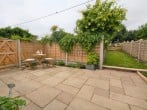 Enclosed patio with small lawn area Enclosed patio with small lawn area