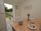 Dining area leading to the enclosed garden Dining area leading to the enclosed garden
