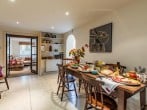Boasting an antique table and chairs, the dining room is the perfect place to entertain Boasting an antique table and chairs, the dining room is the perfect place to entertain