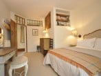 A beautiful double bedroom finished with soft colours A beautiful double bedroom finished with soft colours
