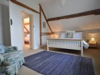 Enjoy a peaceful nights rest in this double bedroom with views across the countryside
