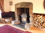 Cosy up infront of the large wood burner in the lounge Cosy up infront of the large wood burner in the lounge