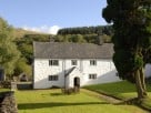 17th Century Farmhouse in a Mountainous Setting