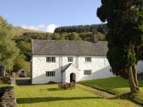 17th Century Farmhouse in a Mountainous Setting