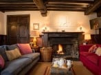 Curl up next to the open fire and read or watch a film Curl up next to the open fire and read or watch a film