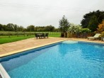 Private heated swimming pool in a beautiful setting