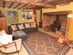 Spend cosy evenings in the snug with wood burner and TV