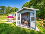 Cute summer house where you can enjoy an evening drink and watch the sunset Cute summer house where you can enjoy an evening drink and watch the sunset