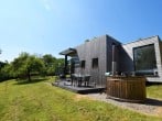 A stunning eco friendly lodge set in an orchard with a wood-fired hot tub A stunning eco friendly lodge set in an orchard with a wood-fired hot tub