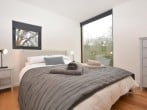 Further king-size bedroom with full length window Further king-size bedroom with full length window