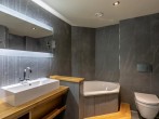 Bathroom with bath and shower Bathroom with bath and shower