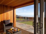 Admire the stunning bay views from the covered decking area 