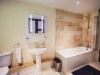 Soak in a hot bubble bath after a day exploring the area Soak in a hot bubble bath after a day exploring the area