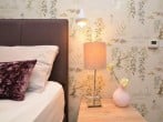 Serene pastels decorate the room Serene pastels decorate the room