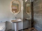 Stylish en-suite wet room with WC