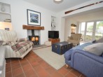 Beautiful lounge with a cosy wood burner