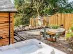 Indulge yourself and relax in the hot tub 