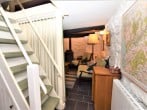 Stairs between kitchen and lounge leading to first floor Stairs between kitchen and lounge leading to first floor