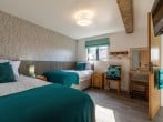 A stylish ground floor super-king-size zip-and-link A stylish ground floor super-king-size zip-and-link