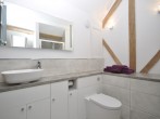 Step down into the en-suite shower room