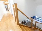 Staircase leading from kitchen 