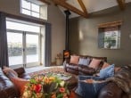 All sit round and have a chat in the cosy living area All sit round and have a chat in the cosy living area