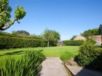 Large garden has a summer house Large garden has a summer house