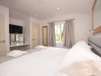 Relax on the comfy super king-size bed