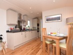 The well-equipped bespoke kitchen and dining areas