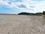 Stroll onto the fabulous beach at Llansteffan with castle overlooking Stroll onto the fabulous beach at Llansteffan with castle overlooking