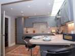 Stylish bespoke kitchen with dining area perfect for romantic meals