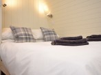 Relax and cosy up on the comfy double bed