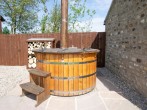 Enjoy the romantic wood-fired hot tub for two