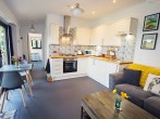 Stylish kitchen and dining space, with bi-folding doors offering fabulous views